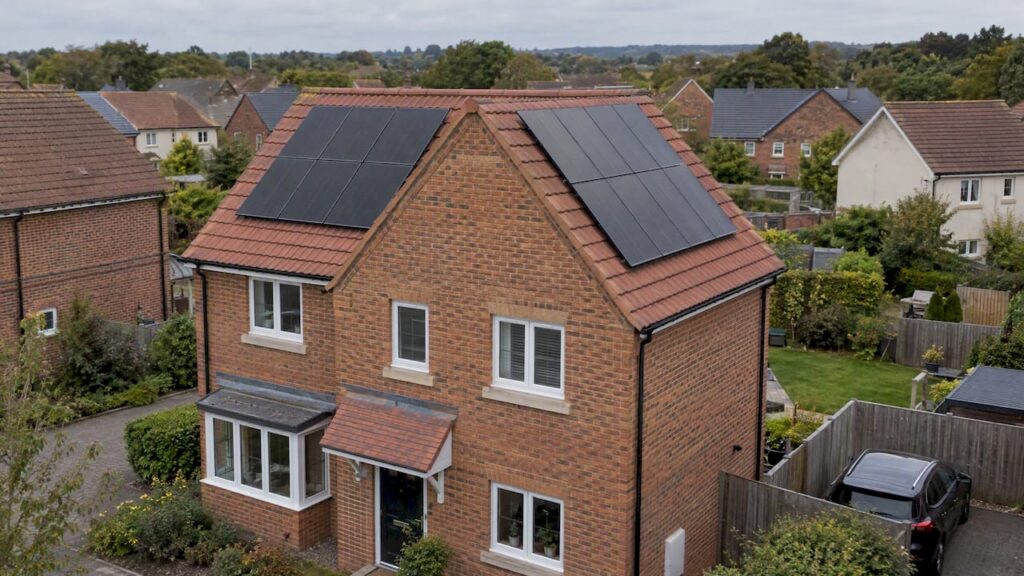 Solar panels on both faces of a split roof